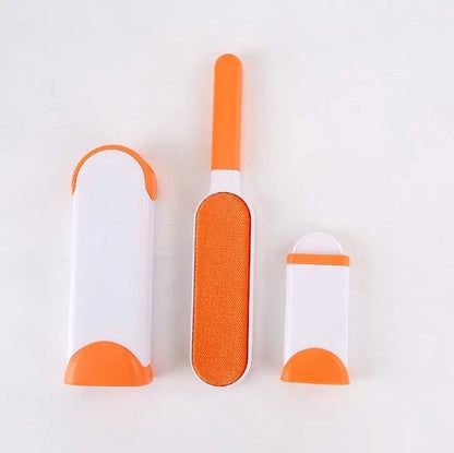 A reusable pet hair remover comb with a self-cleaning base, perfect for removing fur and lint from sofas, chairs, and other upholstery.