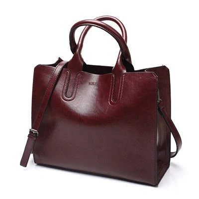 Sofia Spanish Trunk Tote in various colours with multiple compartments and zipper opening