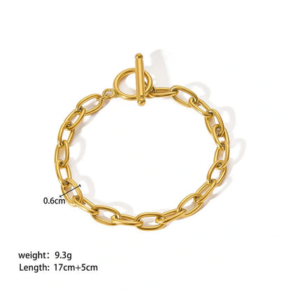 Stainless steel bracelet with real gold treatment in various colours, featuring geometry shapes and ring elements