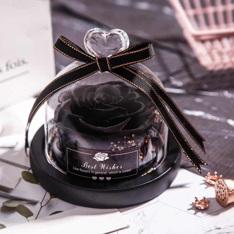 Enchanting Eternal Rose with LED lighting in a glass display, showcasing its timeless beauty and elegant design