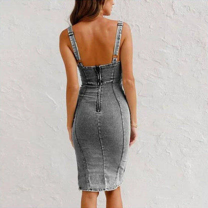 Chic denim dress with modern U-neck design, adjustable straps, and slit detail for a flattering, versatile look