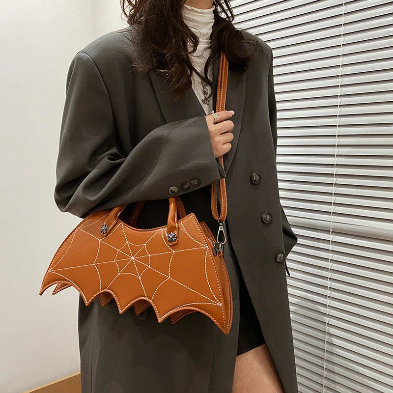 Halloween-inspired Spider Web Messenger Bag with intricate embroidery details, made of high-quality PU leather with adjustable strap