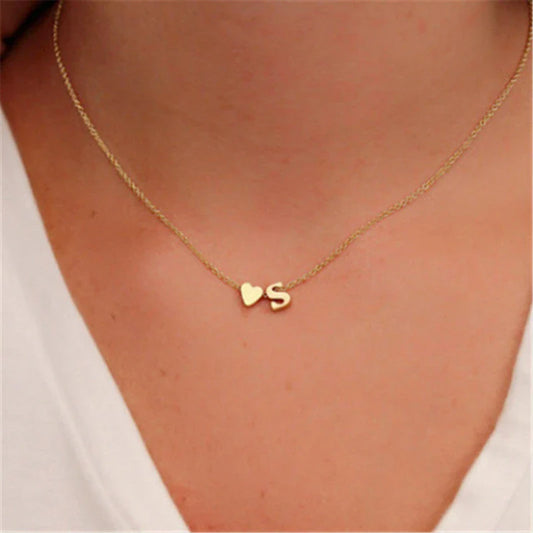 Heart-shaped pendant necklace with adjustable chain in various metallic finishes