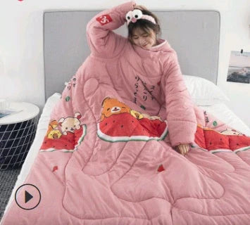 Cozy quilted lounger with sleeves in various colors and sizes, perfect for year-round indoor comfort and relaxation.