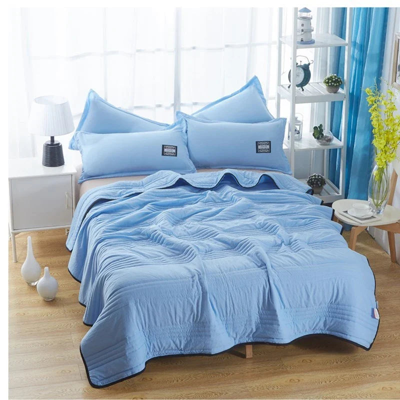 Premium cooling quilts in various colors and sizes for comfortable, temperature-regulating sleep