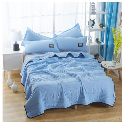 Premium cooling quilts in various colors and sizes for comfortable, temperature-regulating sleep