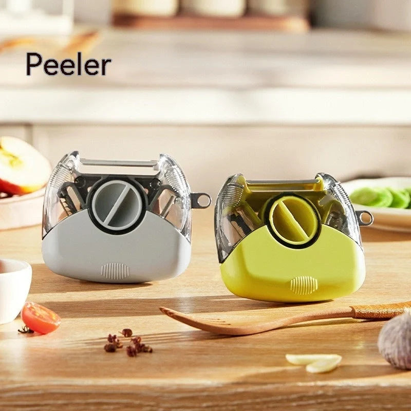 3-in-1 Stainless Steel Peeler Shredder in green and grey with ergonomic handle