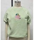 Premier children's clothing in green and pink colours, featuring short shirts in various sizes