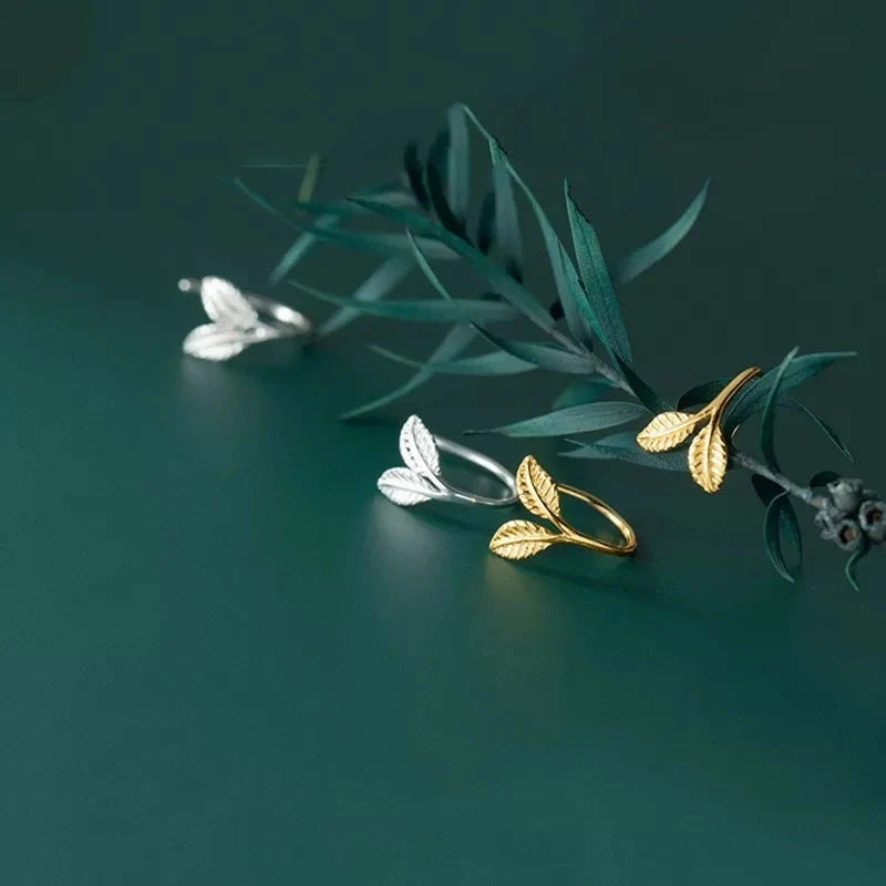 Handcrafted S925 sterling silver branch bud earrings with leaf design