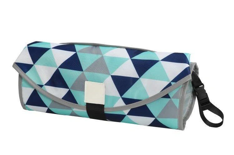 Portable diaper changing pad clutch with built-in toy ring, foldable design for easy transport