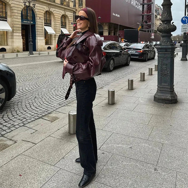 Stylish cropped leather jacket with loose lapel design, available in multiple trendy color options for fashionable streetwear
