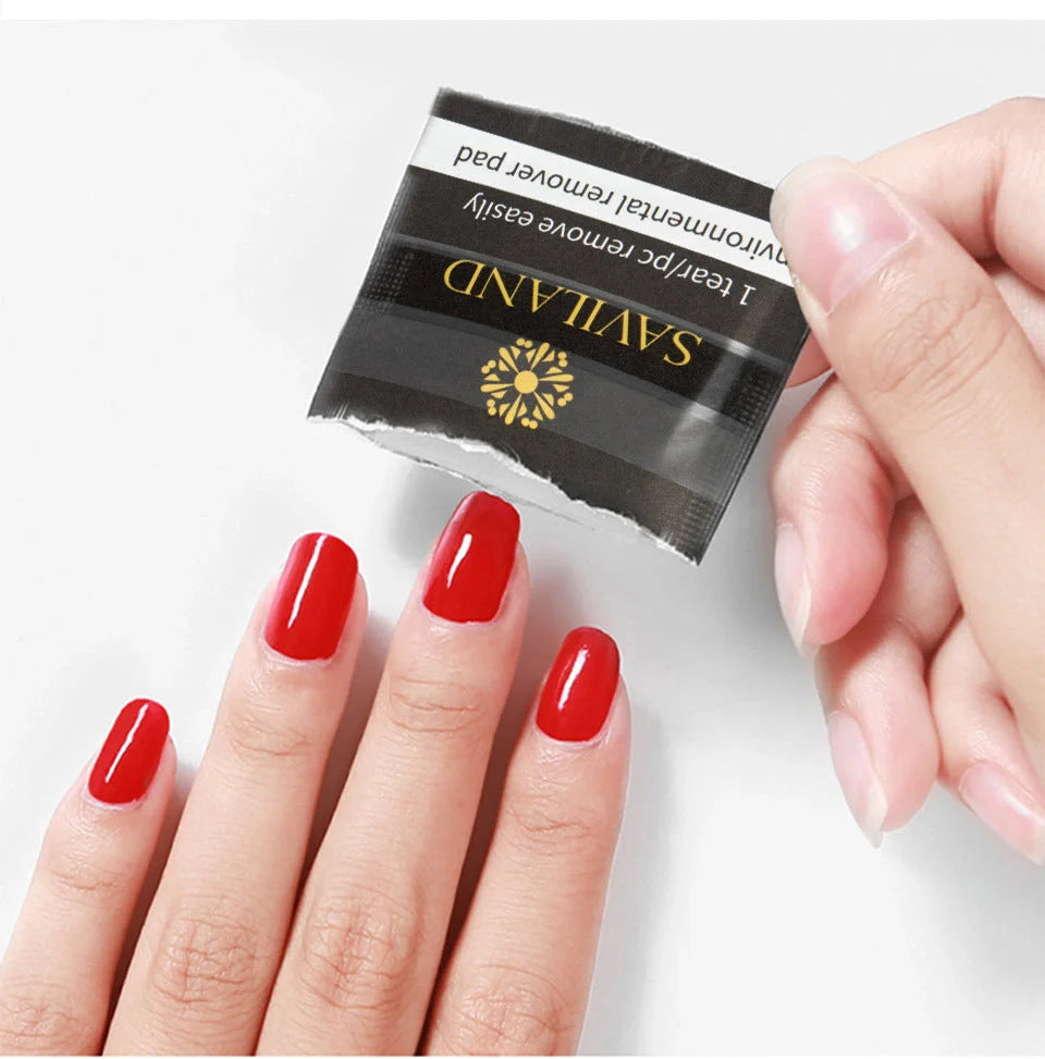 Nail polish remover wraps with self-contained cotton for quick and easy polish removal