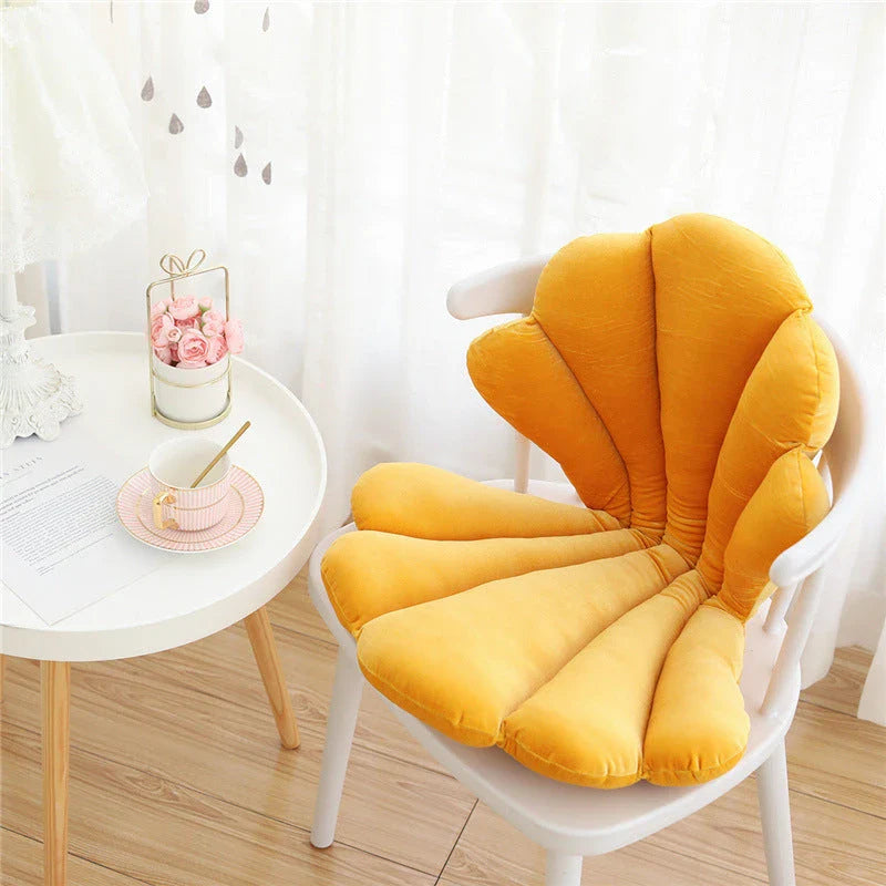 Luxurious velvet armchair cushion with unique rose seat design, available in various colours for comfortable relaxation in your living space.