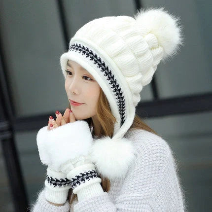 Knit fleece beanie with ear flaps and pompom in various colours for winter warmth