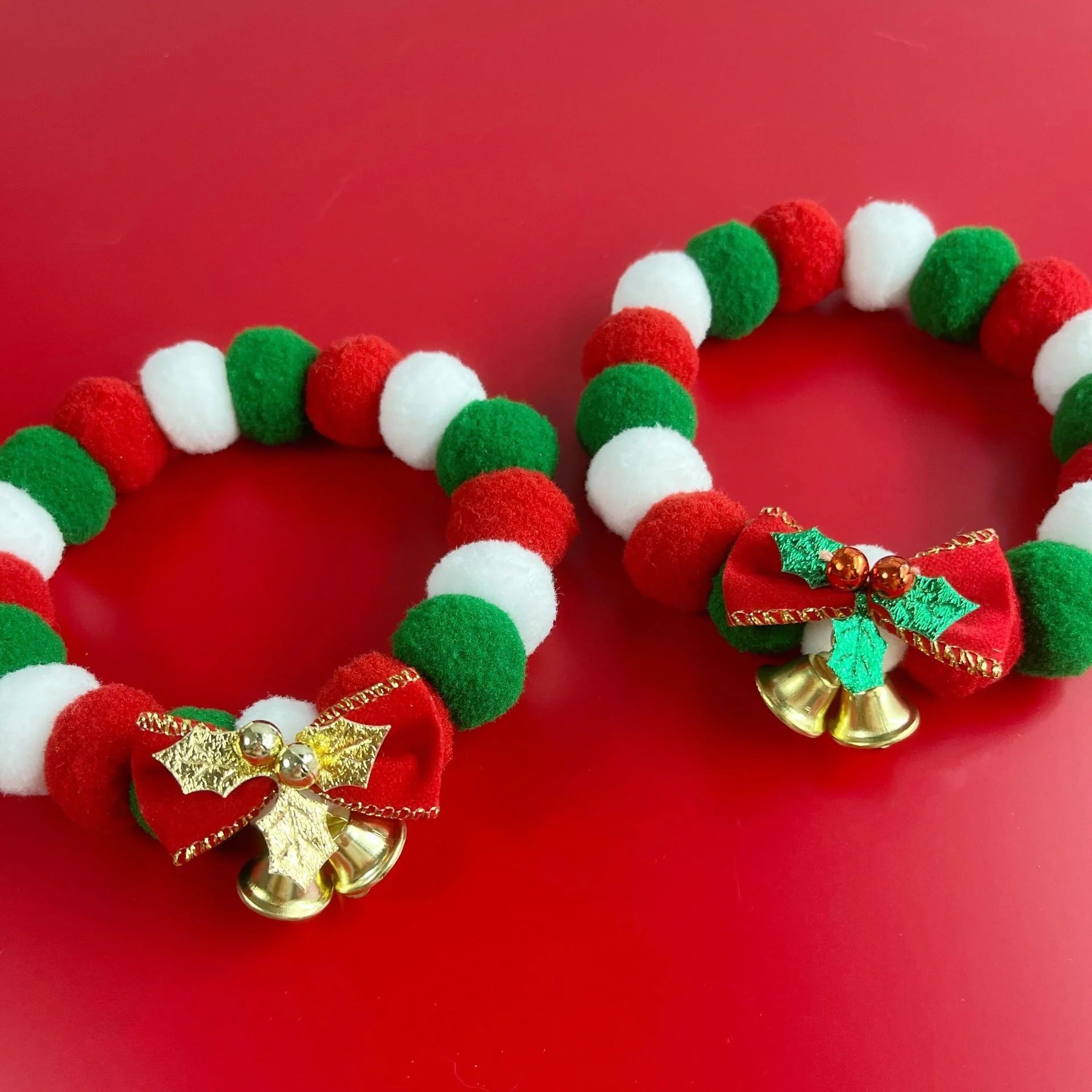 Festive plush ball pet collar with elastic fit for Christmas in green and golden leaves designs