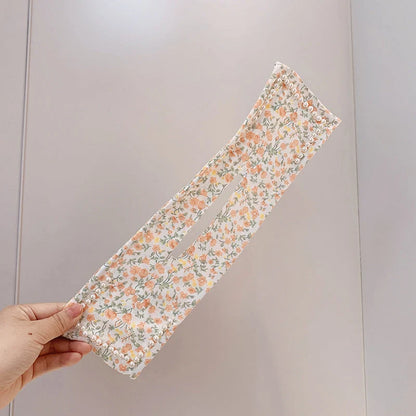 Women's elegant cloth headband with diamond and pearl accents for stylish hairstyles