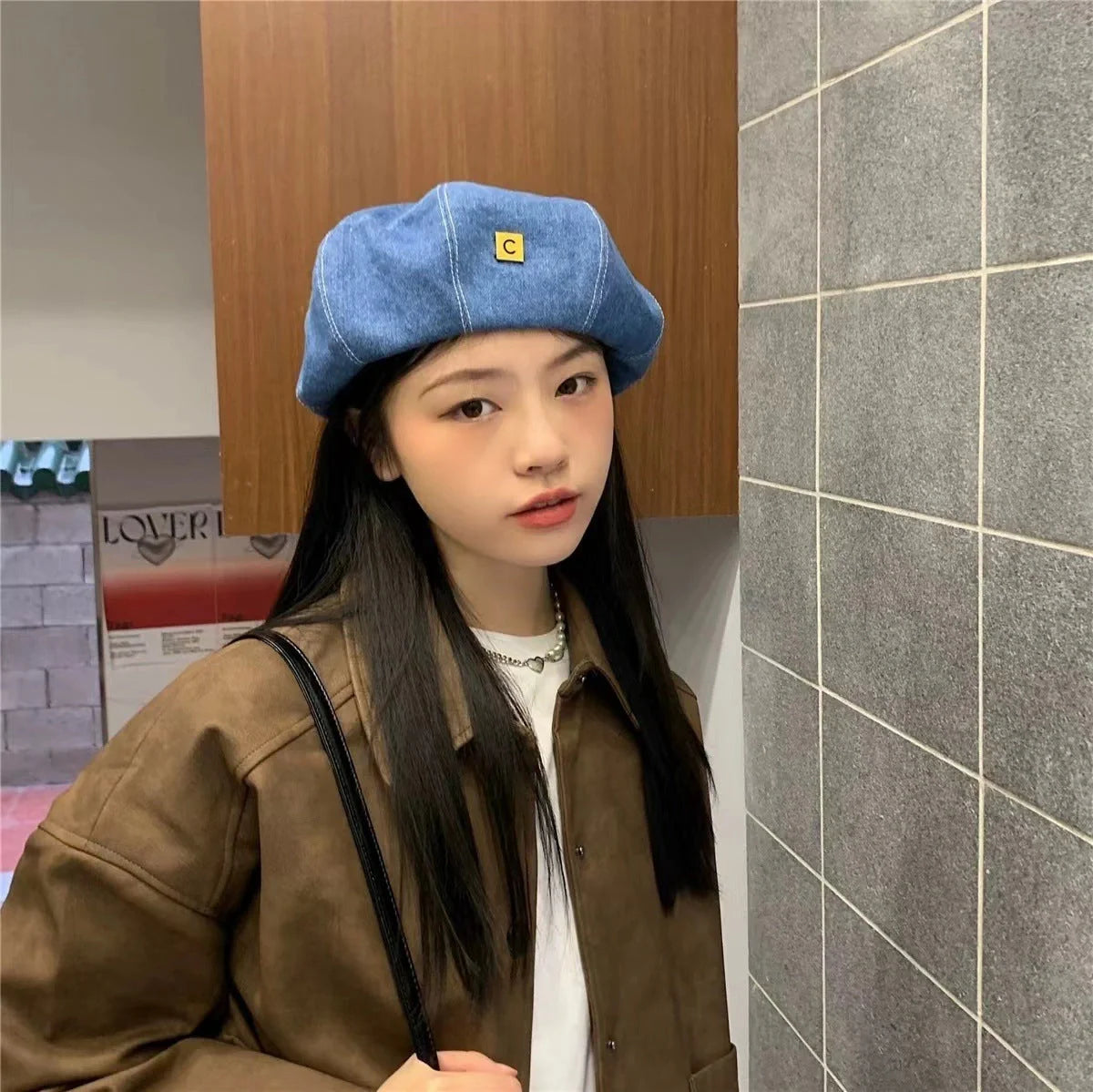 A stylish Japanese-inspired denim beret with a dome-shaped crown and a brimless silhouette, available in light, medium, and dark denim shades.