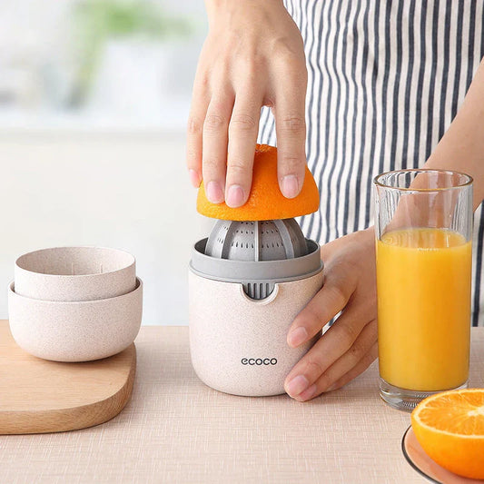 Versatile manual fruit juicer made with wheat straw and PP plastic, capable of juicing a variety of citrus and soft fruits