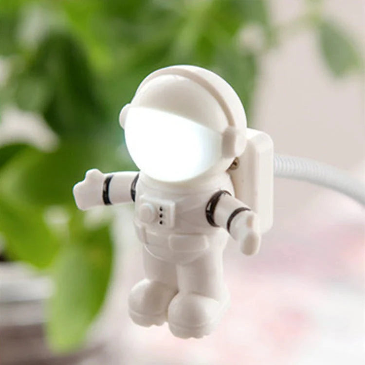 USB Astronaut LED Night Light with flying saucer design, white color, compact size