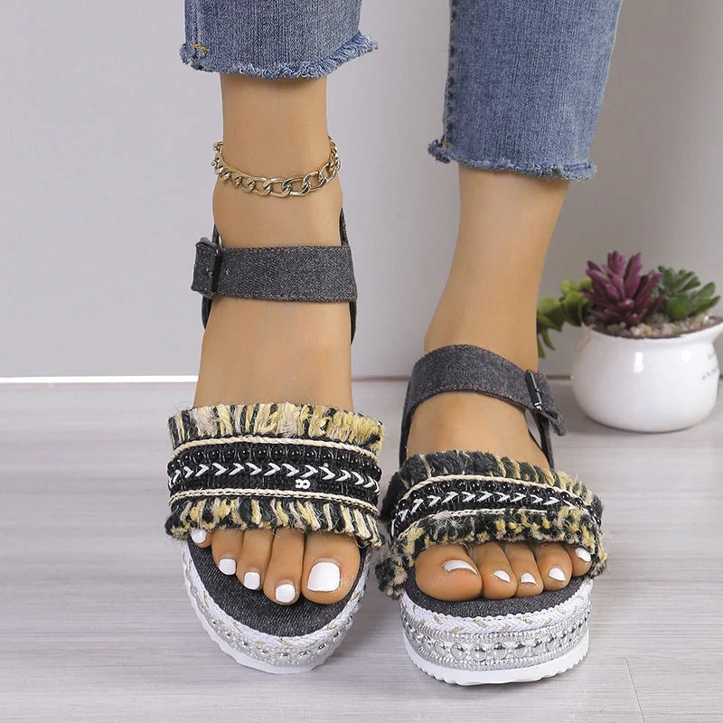 Stylish denim tassel sandals for women with thick flat sole, perfect for summer.