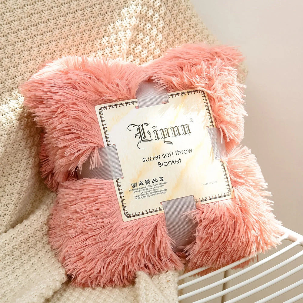 Soft coral fleece blanket in various colours and sizes for cosy bedding