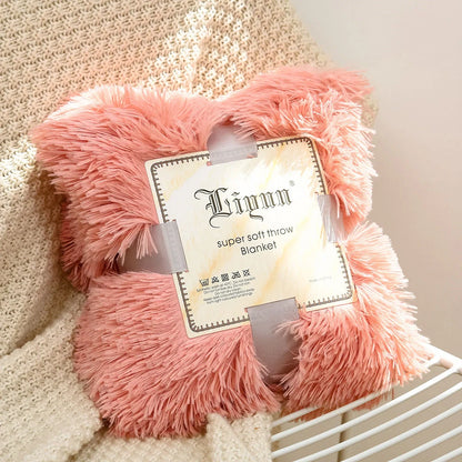 Soft coral fleece blanket in various colours and sizes for cosy bedding