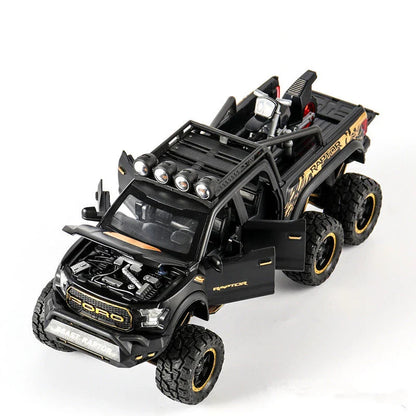 Exquisite 1:28 scale Ford off-road alloy toy car with simulated sound and light effects, damping spring, and six functional doors