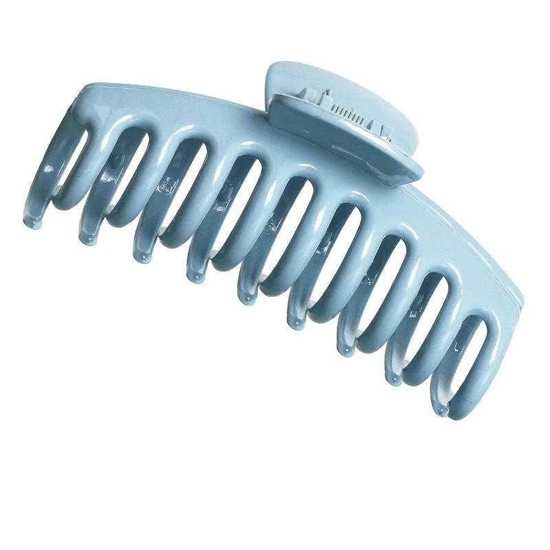 Candy-coloured plastic ponytail clip for showers and daily hair styling