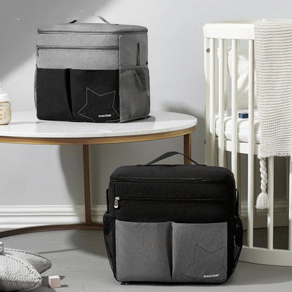 Premium waterproof backpack with multiple compartments, adjustable straps, and mesh side pockets for busy moms on the go.