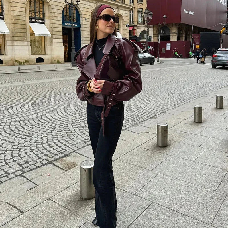 Stylish cropped leather jacket with loose lapel design, available in multiple trendy color options for fashionable streetwear