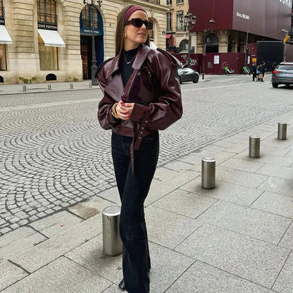 Stylish cropped leather jacket with loose lapel design, available in multiple trendy color options for fashionable streetwear