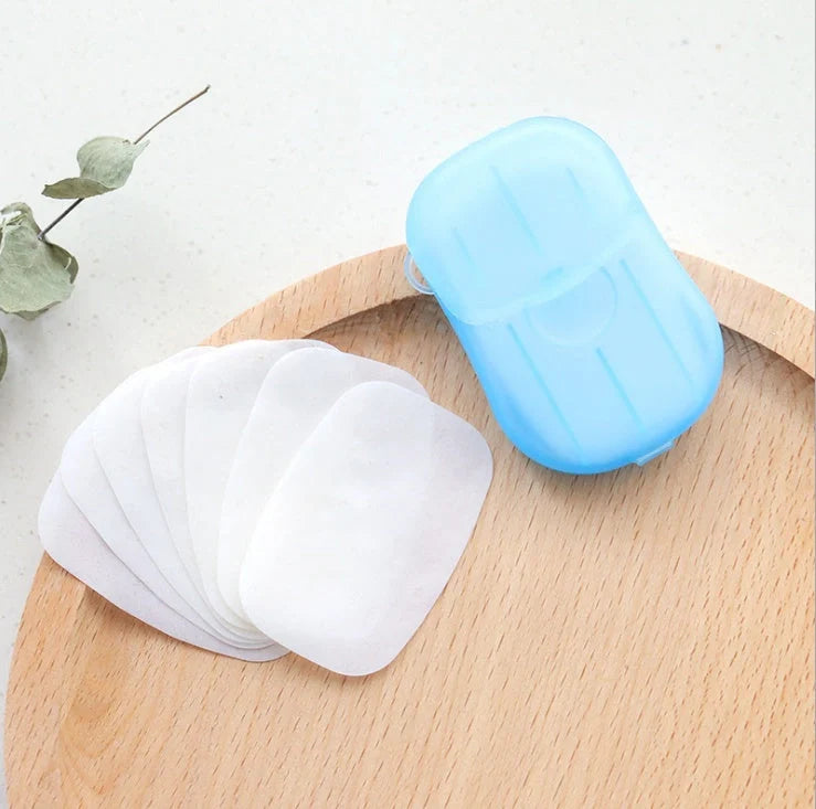 Compact disposable hand soap sheets in various colors, perfect for travel hygiene.
