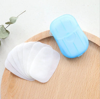 Compact disposable hand soap sheets in various colors, perfect for travel hygiene.
