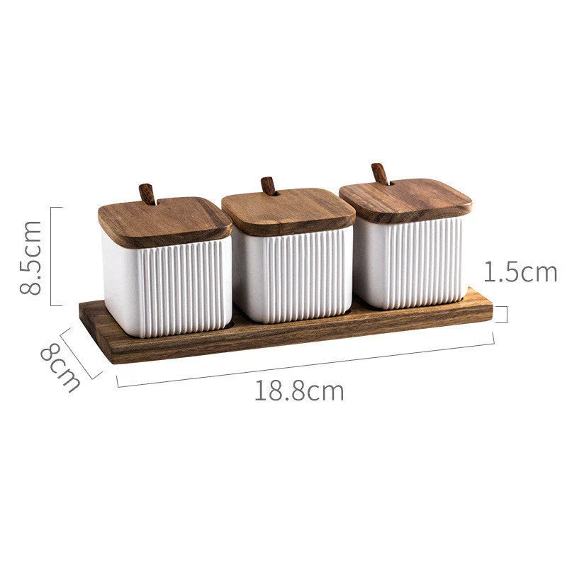 Stylish ceramic seasoning box set with sleek matte finish and airtight lids, perfect for organising spices in a modern British kitchen
