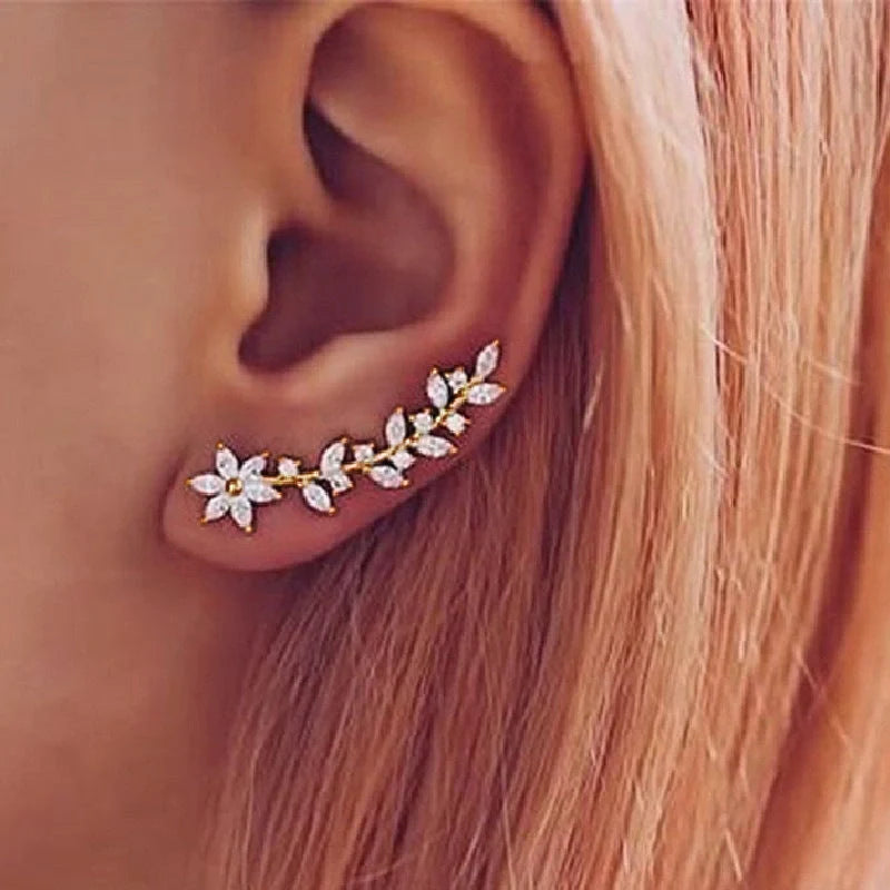 Stylish diamond flower earrings for women in white gold, gold, and rose gold