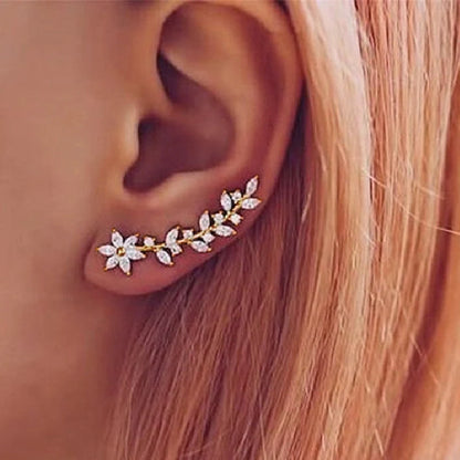 Stylish diamond flower earrings for women in white gold, gold, and rose gold