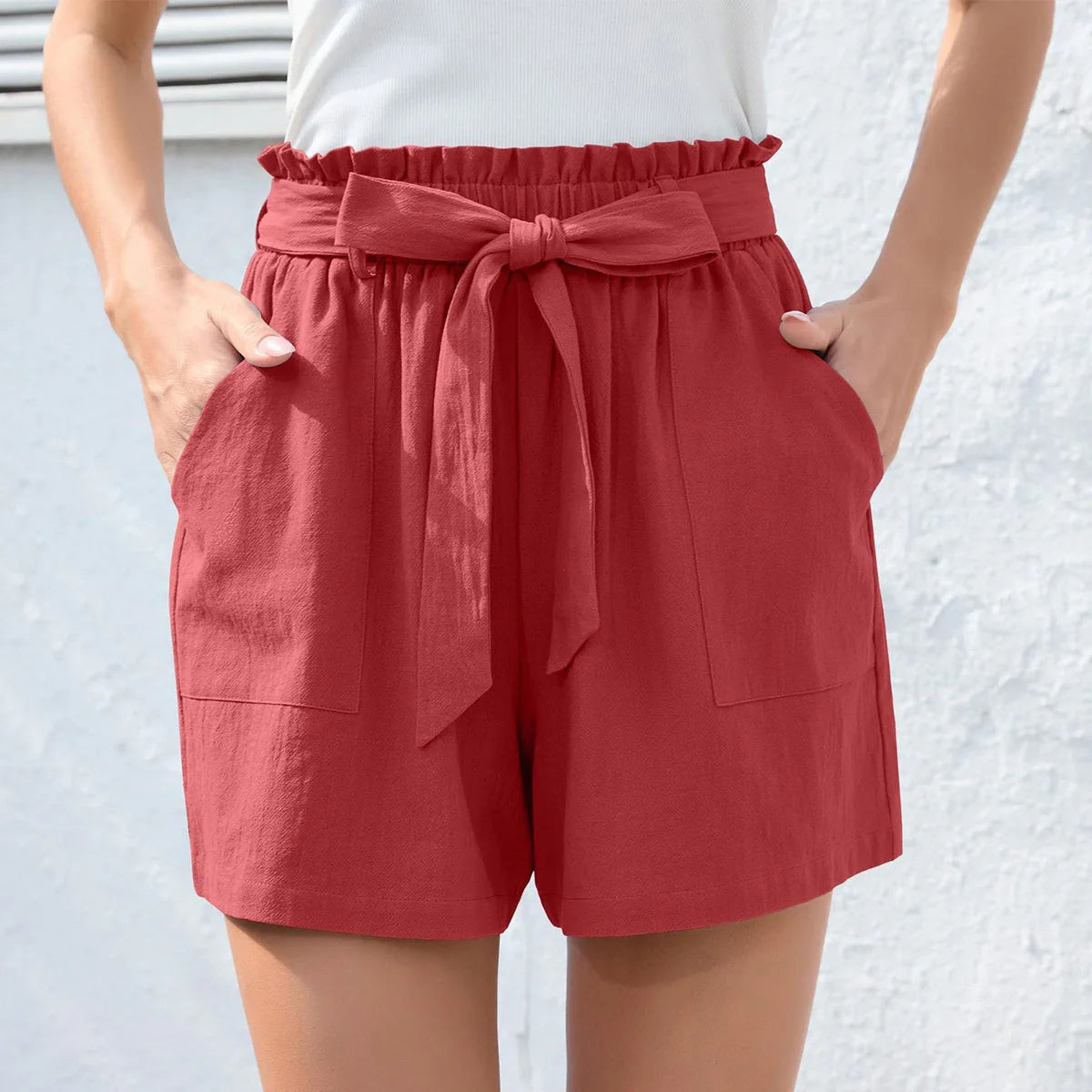 Stylish high waist women's shorts with ruffle bow tie detail and pockets for summer