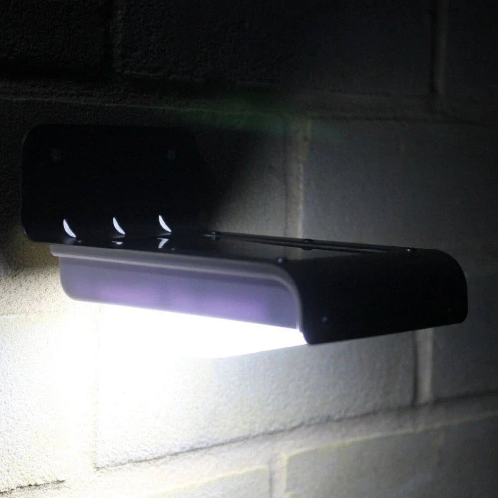 Solar-powered motion-activated outdoor light with bright LED illumination, weatherproof design, and automatic sensor activation