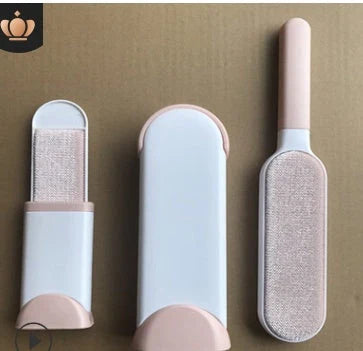 A reusable pet hair remover comb with a self-cleaning base, perfect for removing fur and lint from sofas, chairs, and other upholstery.
