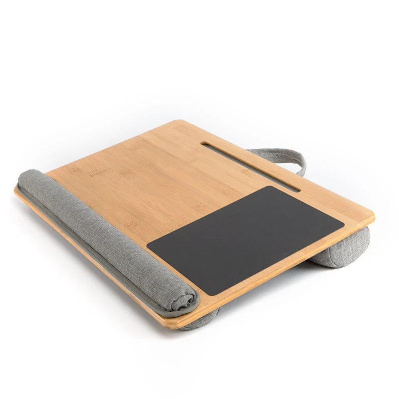 Elegant bamboo lap desk with cushioned surface and card slots for relaxing laptop use