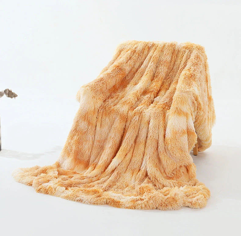 Cosy and luxurious faux fur throw blanket in a variety of colours and sizes, perfect for adding warmth and style to your living space