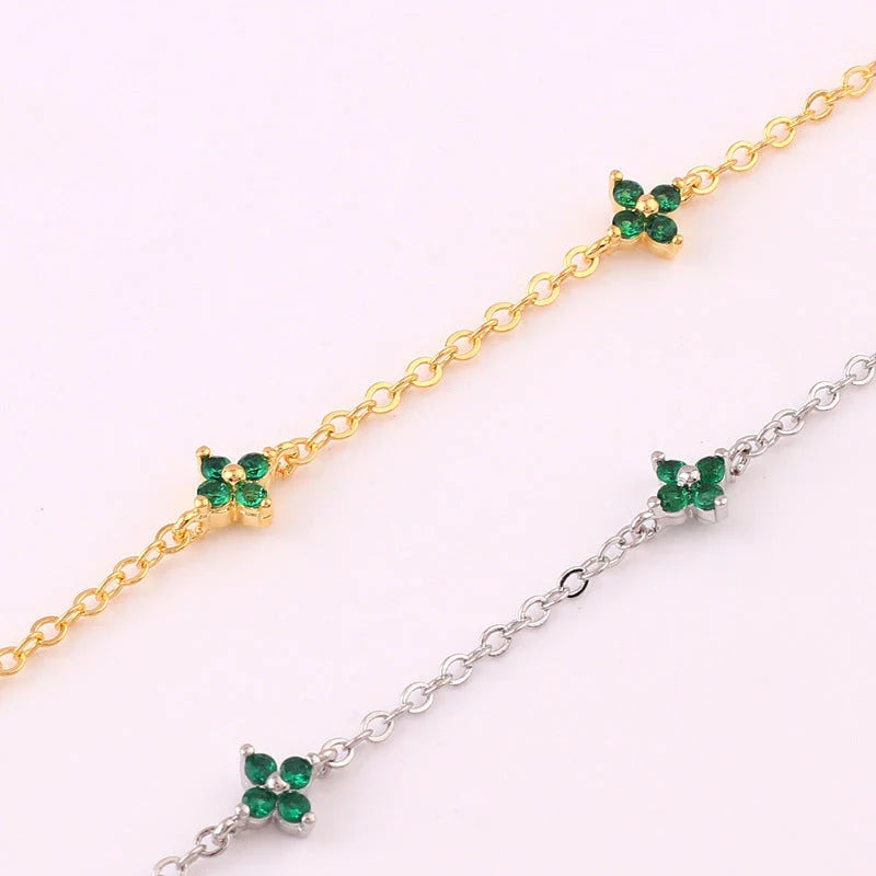 Elegant floral statement necklace in various color options, including golden blue, silver blue, golden green, and silver green, with an adjustable chain and high-quality construction.