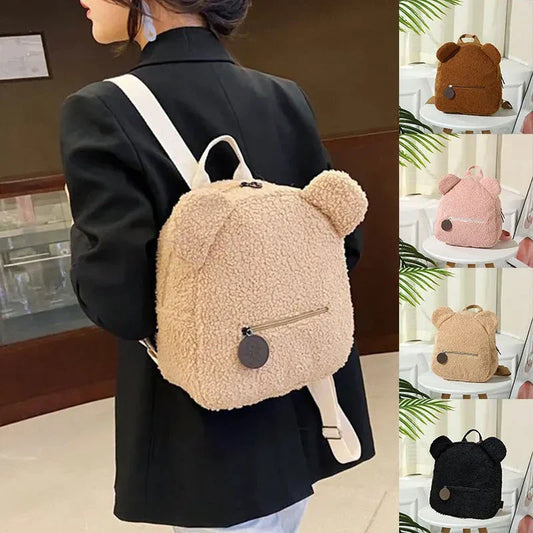 Adorable bear-shaped backpack made of soft fleece material in various colors, featuring a spacious main compartment and adjustable shoulder straps for comfortable wear.