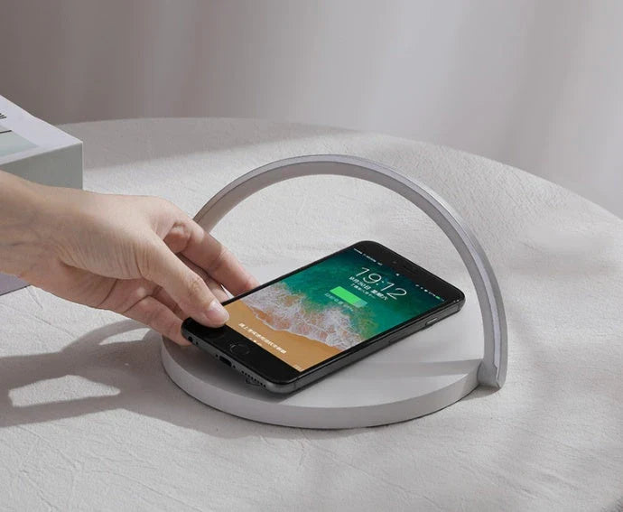 Foldable wireless charging stand with integrated LED table lamp for smartphones