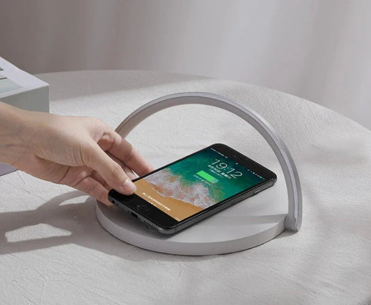 Foldable wireless charging stand with integrated LED table lamp for smartphones
