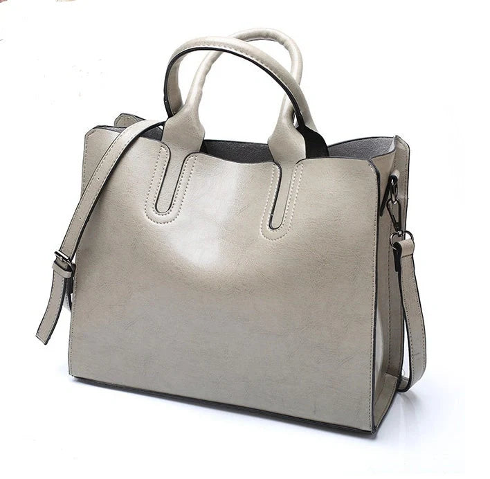 Sofia Spanish Trunk Tote in various colours with multiple compartments and zipper opening