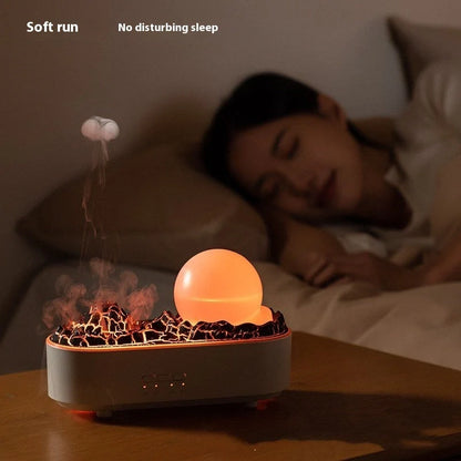 USB Volcano Humidifier on a desktop, emitting a heavy fog for air moisture
