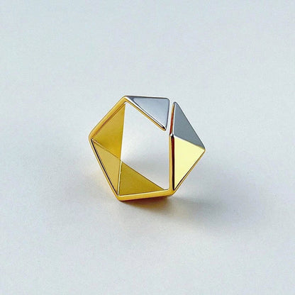 Close-up of a 18K gold-plated ring featuring a genuine meteorite insert with mesmerising natural patterns