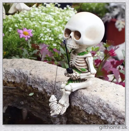 Charming fisherman's skeleton Halloween decor with a tiny skeleton fish, perfect for adding spooky flair to your home or garden this season.