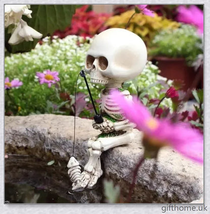 Charming fisherman's skeleton Halloween decor with a tiny skeleton fish, perfect for adding spooky flair to your home or garden this season.